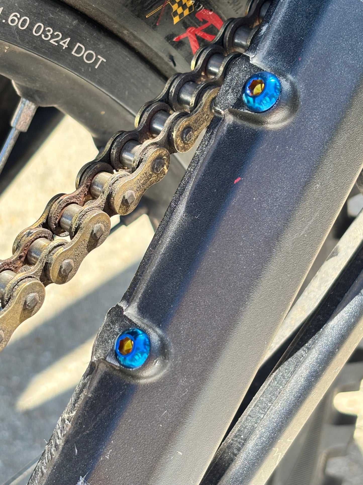 E-Moto chain guard titanium